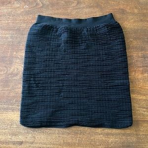 Black stretch mini skirt. Size one.
